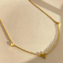 Load image into Gallery viewer, Triple heart necklace in gold

