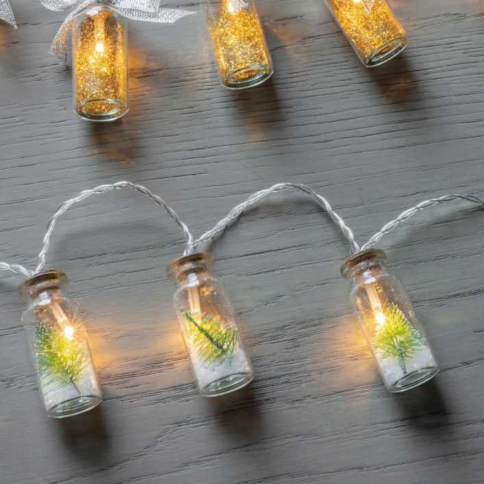10 LED string lights with pine trees and snow in jars