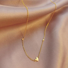 Load image into Gallery viewer, Triple heart necklace in gold
